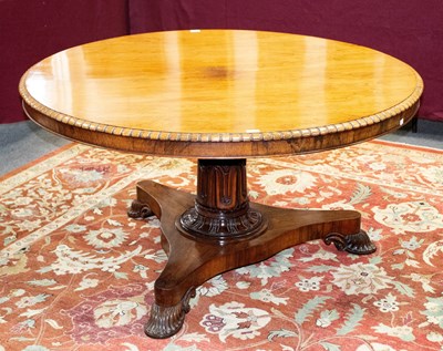 Lot 750 - A Regency rosewood circular dining table, the...