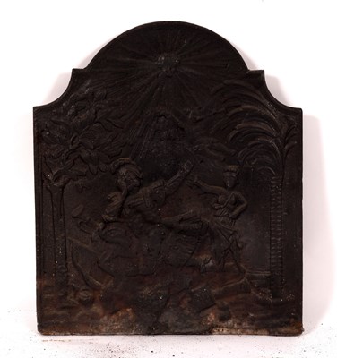 Lot 765 - A cast iron arch-top fire back, decorated a...