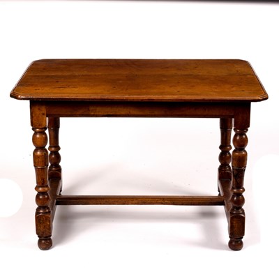 Lot 783 - A 17th Century style walnut table on turned...