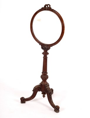 Lot 811 - A Victorian walnut fire screen the circular...