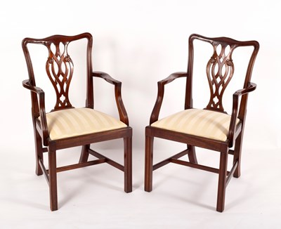 Lot 822 - A pair of Georgian style open armchairs with...