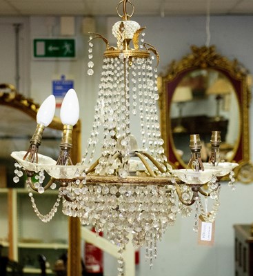 Lot 824 - A five-branch chandelier hung with swags of...