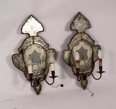 Lot 831 - A pair of Venetian mirrored girandoles, of...