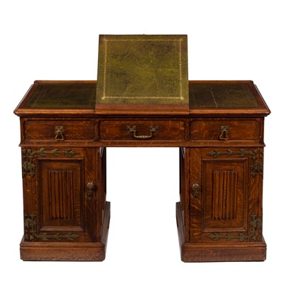 Lot 844 - A Gothic revival oak desk with linen fold...