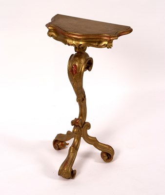 Lot 854 - An Italian giltwood pier table, on scroll...