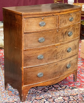 Lot 870 - A 19th Century mahogany bowfront chest of two...