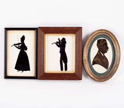 Lot 968 - A 19th Century silhouette of a violinist, 10cm...