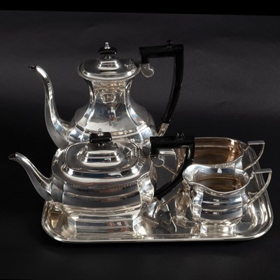 Lot 1 - A silver plated four-piece tea and coffee set,...