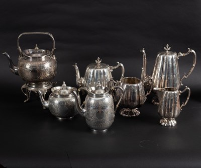 Lot 2 - A silver plated tea kettle, the matching...