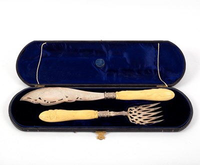 Lot 10 - A pair of Victorian silver fish servers, H H,...