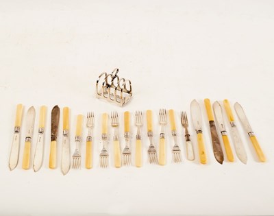 Lot 11 - Nine pairs of fish knives and forks with...