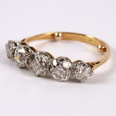 Lot 54 - A diamond five-stone ring, the graduated...
