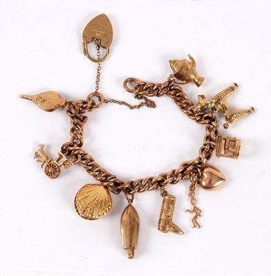 Lot 60 - A 9ct gold charm bracelet with various charms...