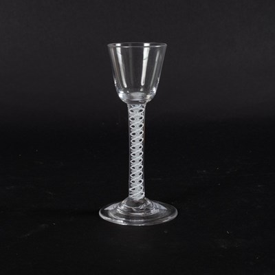 Lot 115 - An 18th Century cordial glass on a cotton...