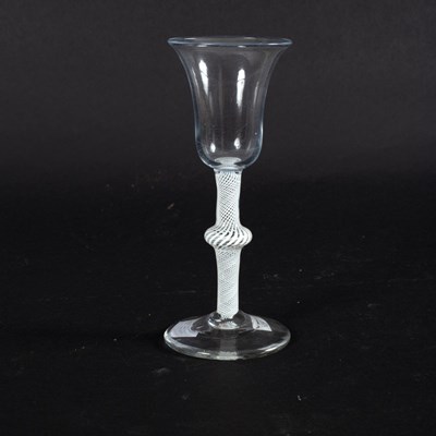 Lot 116 - An 18th Century wine glass with bell-shaped...