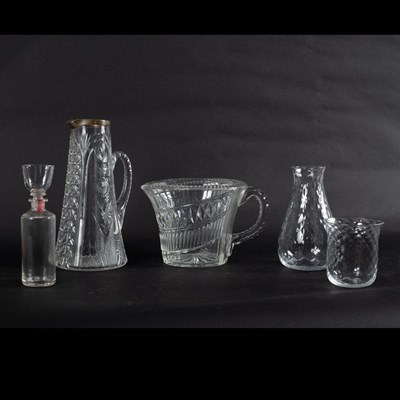 Lot 122 - An early 19th Century cut glass jug with loop...