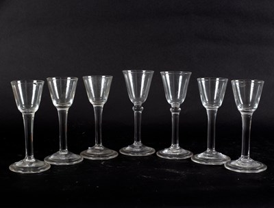 Lot 124 - Seven 18th Century drawn stem wine glasses,...