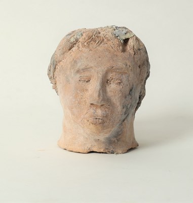 Lot 186 - A pottery model of a male head, 13cm high