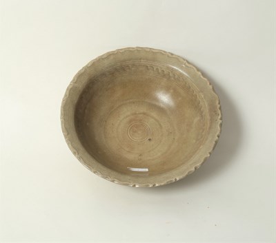 Lot 191 - A Chinese celadon bowl, Yuan dynasty, with...