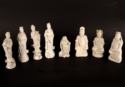 Lot 211 - Eight blanc-de-chine figures, Guanyin and others