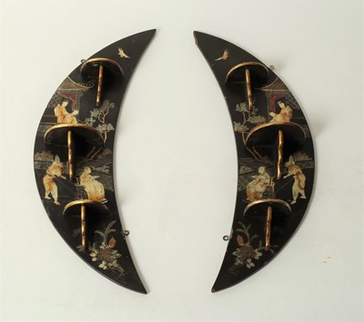 Lot 218 - A pair of Oriental crescent shaped lacquer...