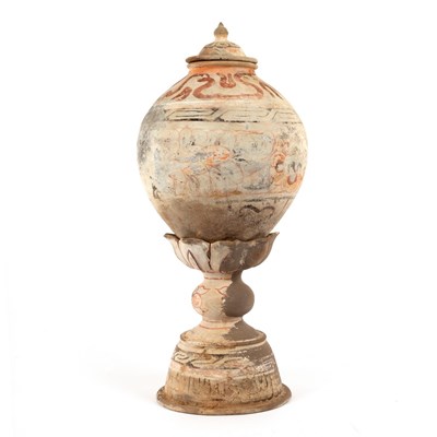 Lot 225 - A Chinese earthenware tower jar, Tang dynasty,...