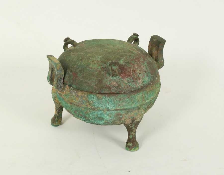 Lot 230 - A Chinese bronze ding, Han dynasty, the