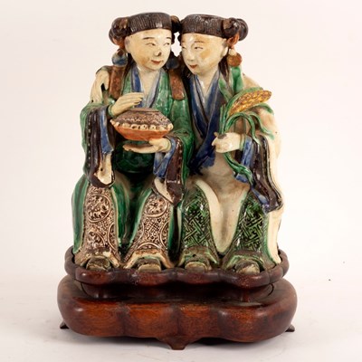 Lot 243 - A Chinese 19th Century pottery figure of the...