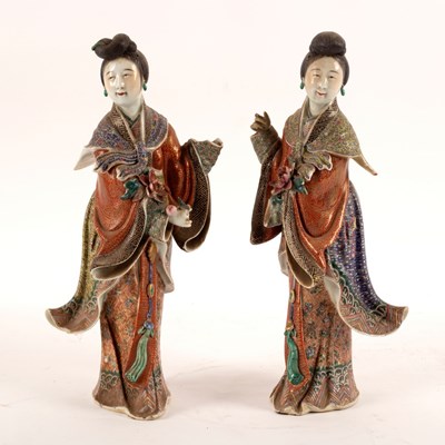 Lot 245 - A pair of Chinese porcelain figures of bijin...