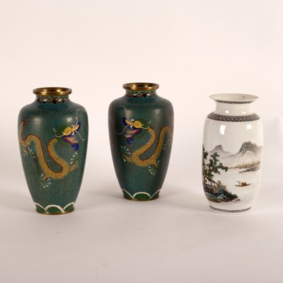 Lot 271 - A pair of cloisonné vases decorated dragons,...