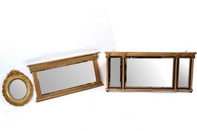 Lot 311 - A Regency overmantel mirror, the three plates...