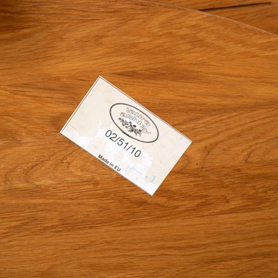 Lot 329 - A Laura Ashley modern oak oval coffee table,...