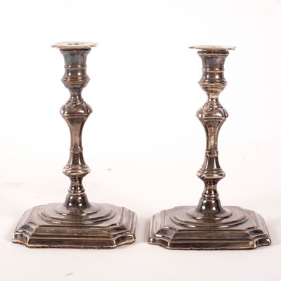 Lot 2 - A pair of Queen Anne style silver taper sticks,...