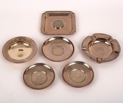 Lot 19 - Six silver ashtrays, 20th Century, the largest...