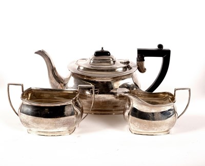 Lot 39 - A three-piece silver tea set, Birmingham 1934,...