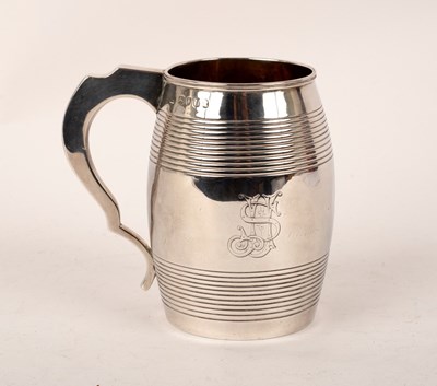 Lot 81 - A George III silver barrel-shaped mug, London...