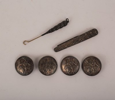 Lot 103 - Four Continental circular silver buttons,...