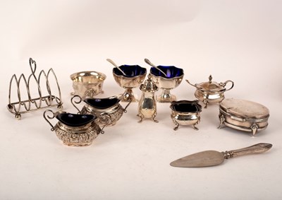 Lot 113 - A quantity of silver cruets, a silver toast...