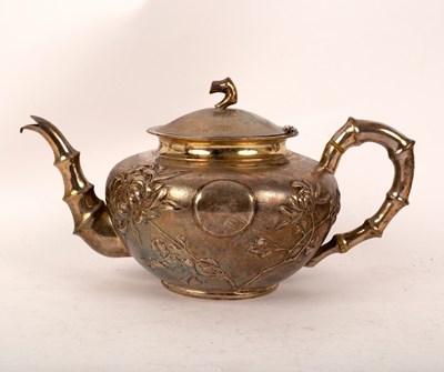 Lot 129 - A Chinese export silver teapot, circa 1900,...