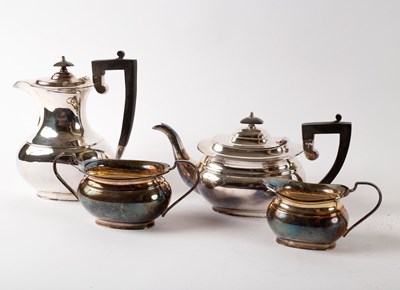 Lot 131 - An electroplated nickel silver four-piece tea set