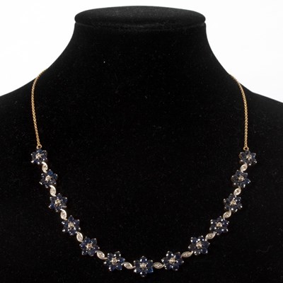 Lot 159 - A sapphire and diamond necklace of thirteen...