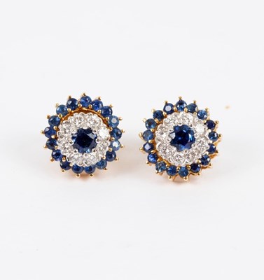 Lot 160 - A pair of sapphire and diamond cluster ear...