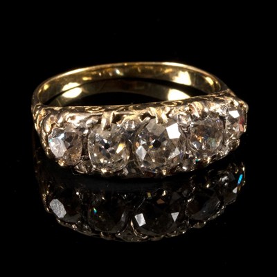 Lot 183 - A five-stone diamond ring, the graduated...