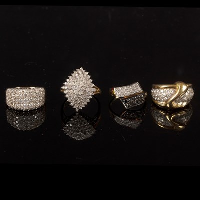 Lot 217 - Four diamond dress rings, each set in 9ct gold,...