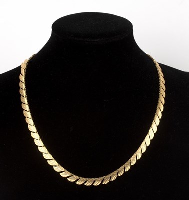 Lot 224 - A 9ct gold filigree necklace, the fringe of...