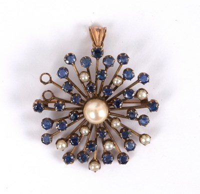 Lot 227 - A sapphire and pearl starburst pendant,...