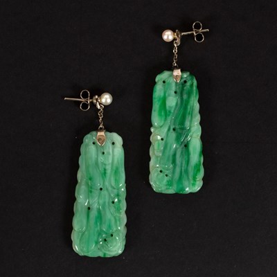 Lot 240 - A pair of carved jade ear pendants, each...