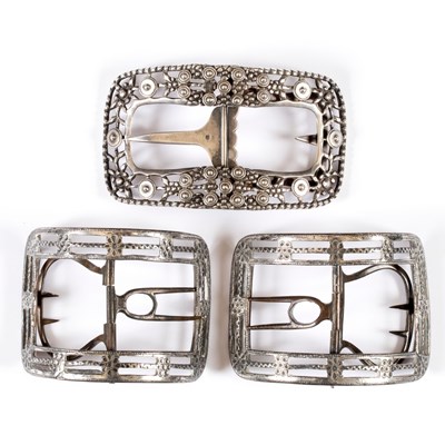 Lot 263 - A Continental silver buckle of curved oblong...