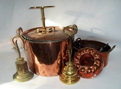 Lot 320 - A two-handled copper pan with lid, two door...