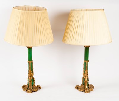 Lot 360 - A pair of gilt metal mounted lamp bases, 61cm...